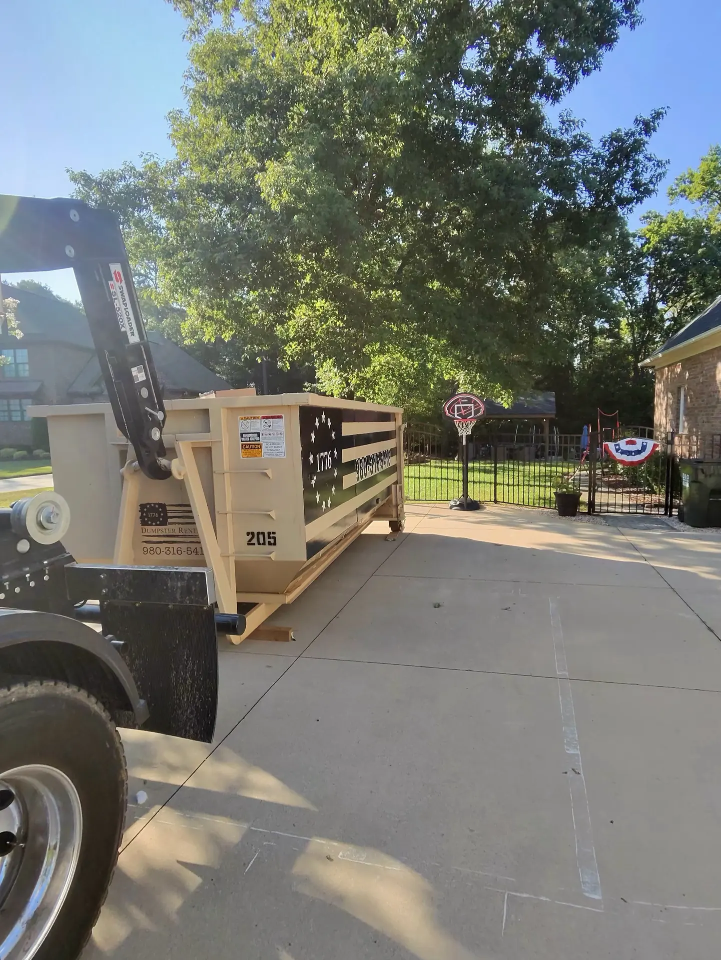 1776 dumpster delivery at a residential property