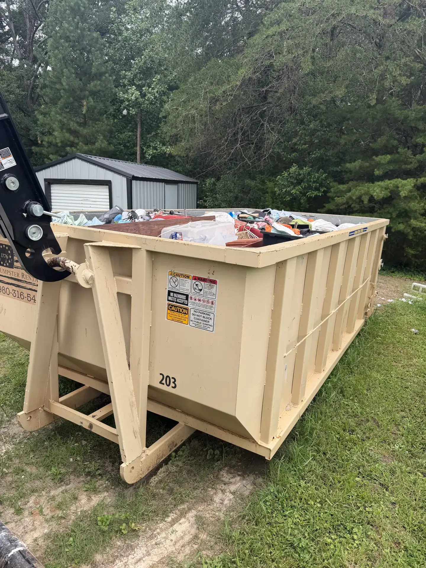 Moving and Downsizing with a 1776 dumpster